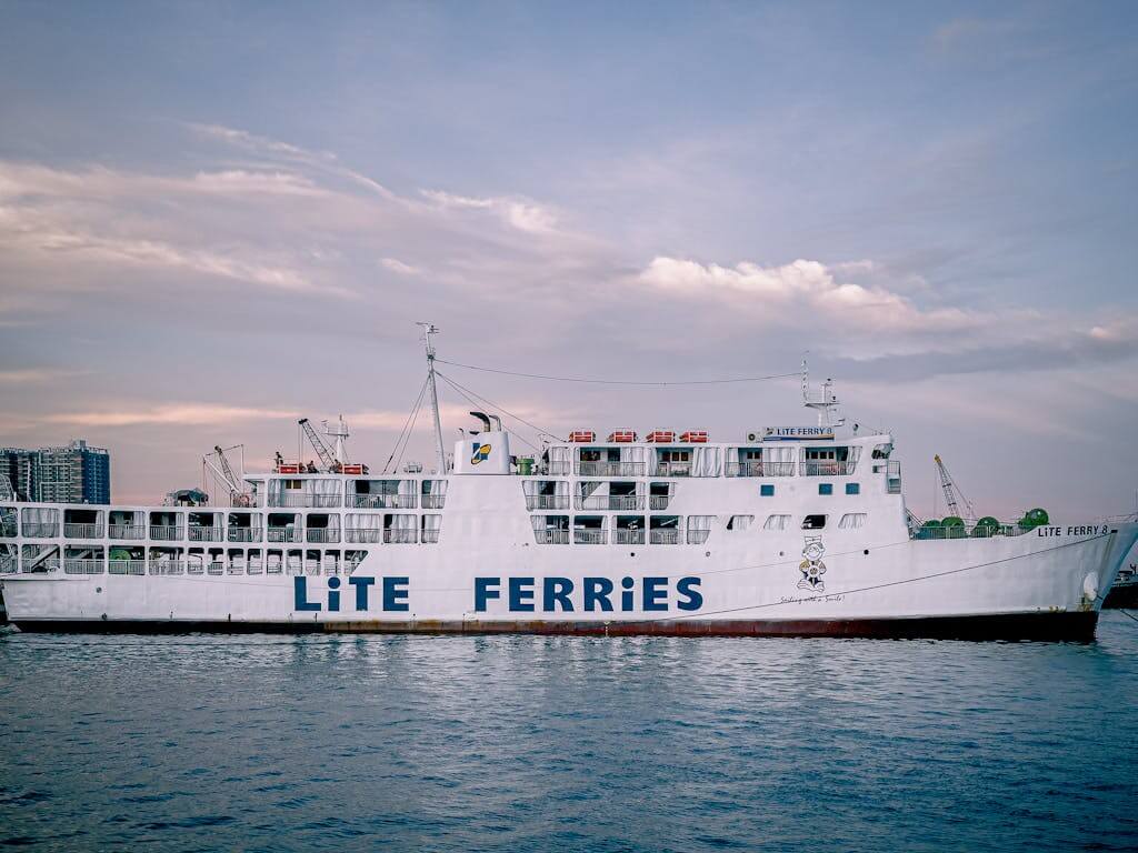 Large Lite Ferry ship docked in Cebu City, Philippines at dusk.