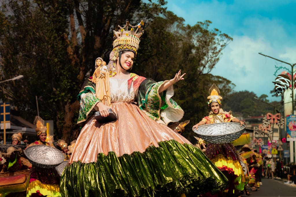 Colorful celebration with dancers in traditional costumes at the Panagbenga Festival, Baguio, Philippines.